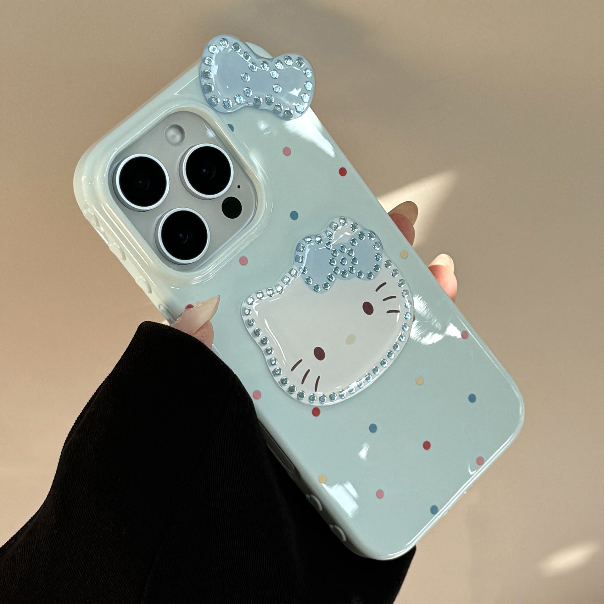 Three-dimensional gilt is suitable for 17promax Apple 16 mobile phone case iphone14 color polka dot bow cat 13 pendant.